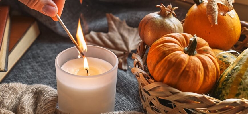 Hand,With,Burning,Match,Lighting,A,Candle,On,The,Windowsill
